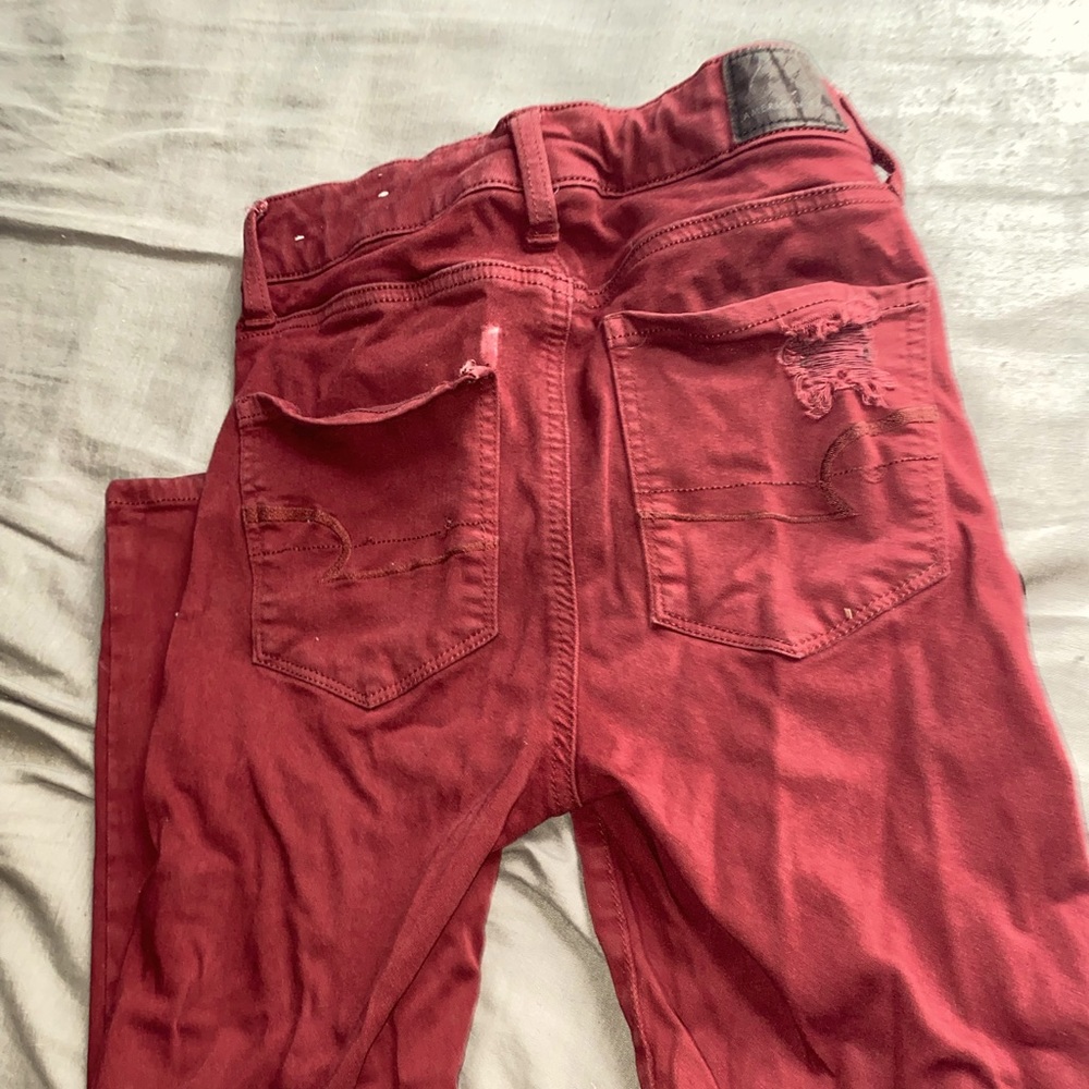 Red distressed American eagle jeans. Size 4